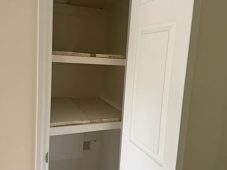 Upstairs bathroom closet