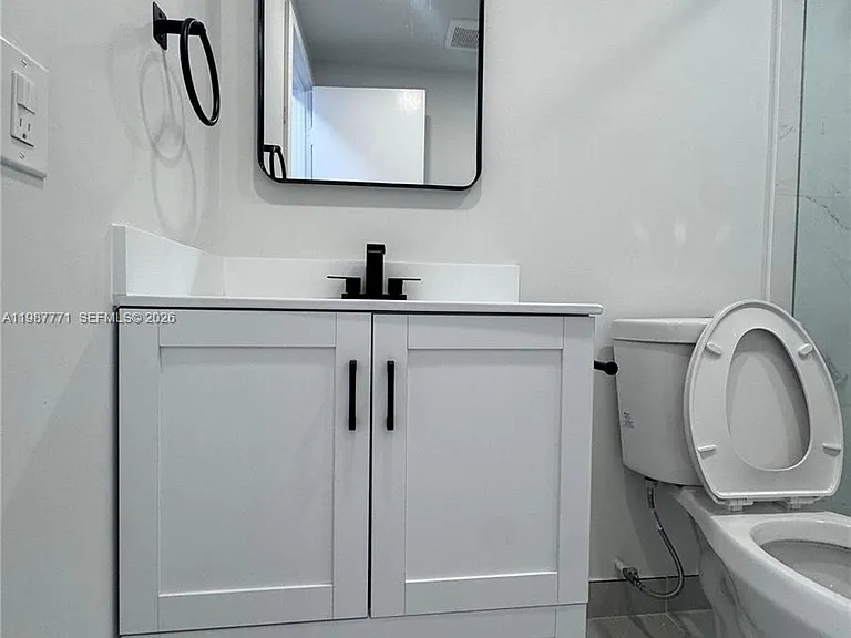455 Golden Isles Dr #203 — Photo 11