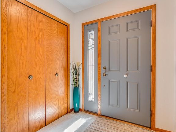 Large entry with attached garage entrance.