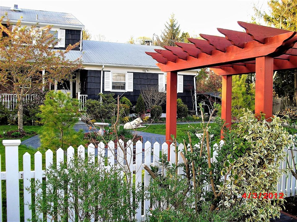 Front of House View (Fenced and Security Cameras)