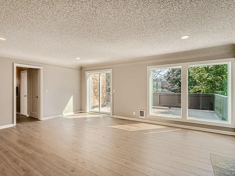 Main living area and East facing exterior deck