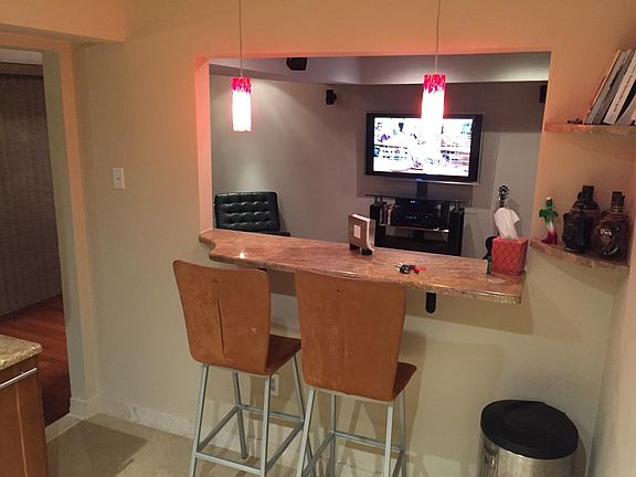 Kitchen bar Looking into Living room (stools included)