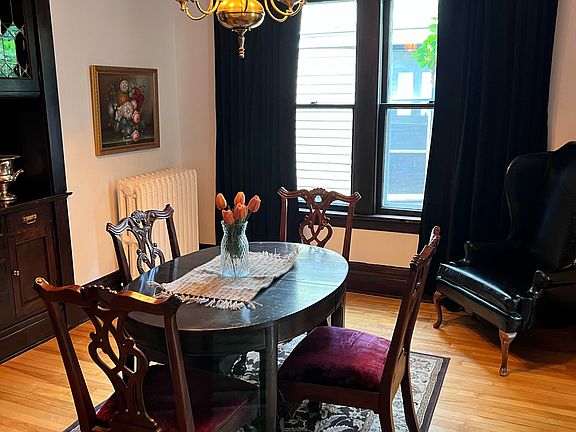 Formal dining room with built in buffet.