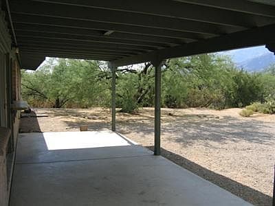 N face covered patio facing Catalina Mtns and backing up to State land.