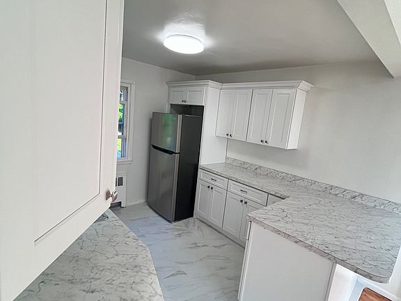 White cabinets throughout with for plenty of storage.