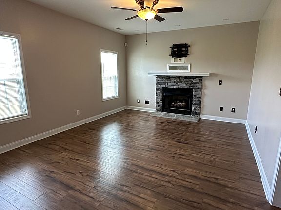 Living room with gas fireplace and TV mount