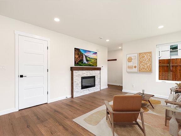 Main floor open living and dining with 1/2 bath.