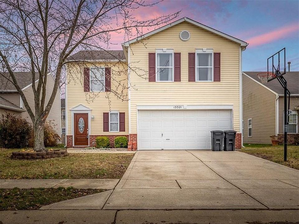 Front of house with basketball goal