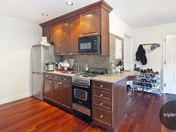 2nd image of 420 E 11th St APT 5B