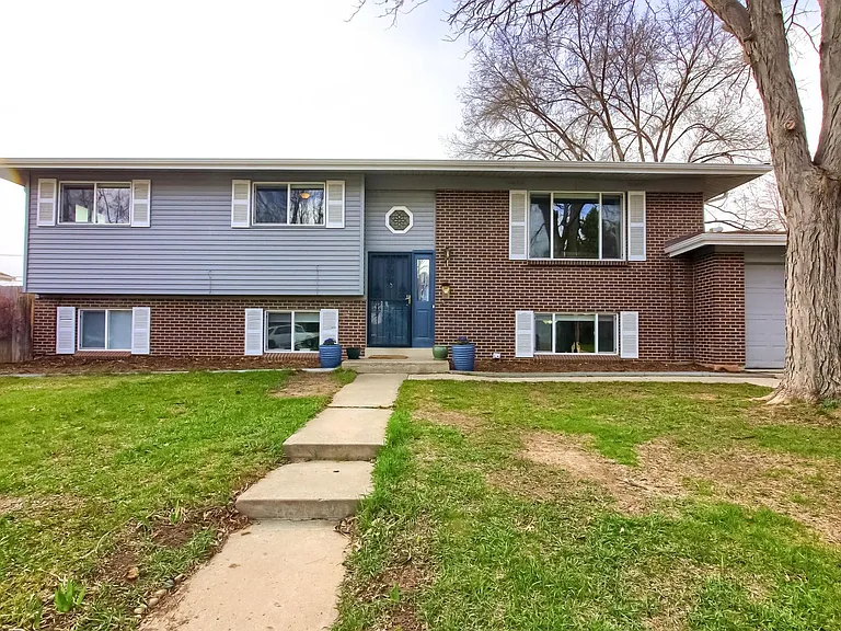10976 W 62nd Ave — Photo 1