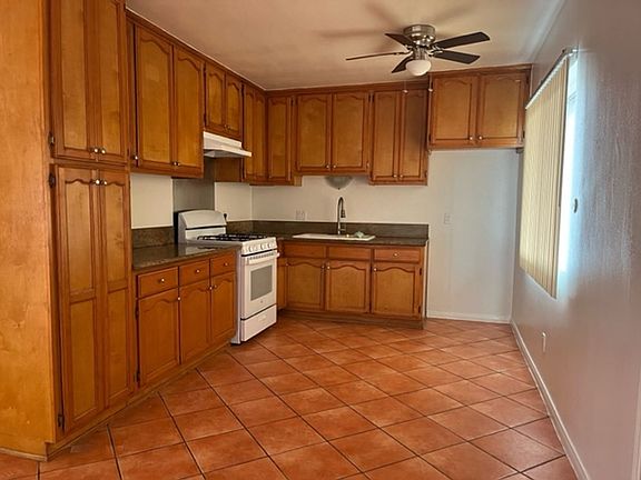 2nd image of 12805 S Hoover St #17