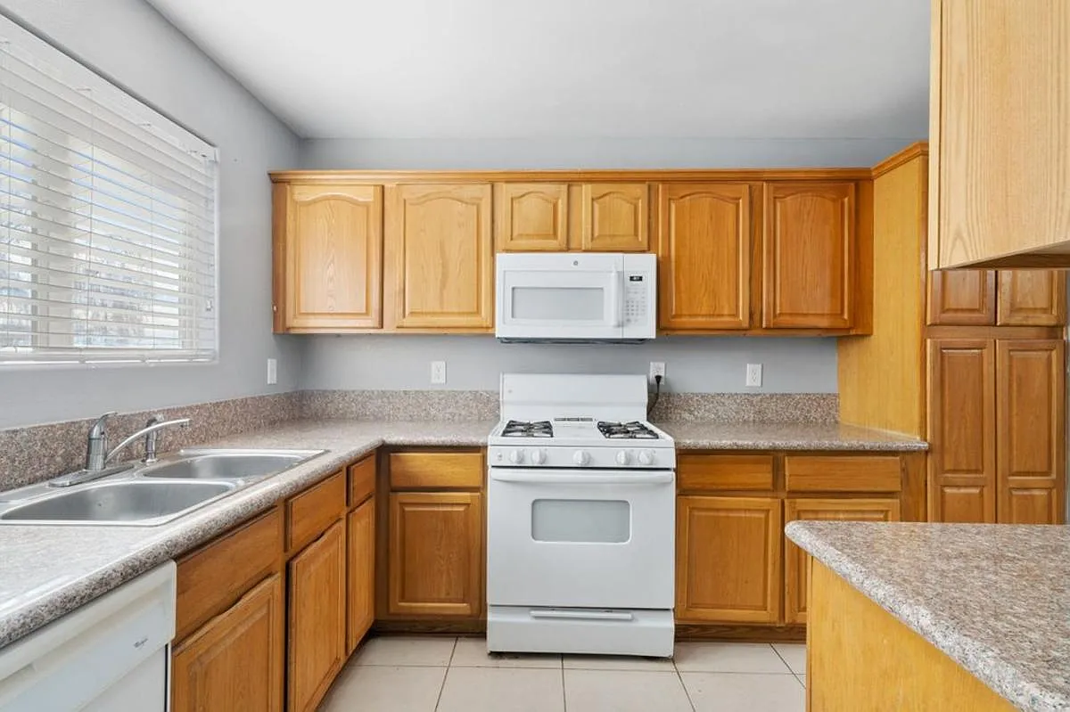Large Renovated 3-Bed/2.5-Bath Townhomes at a Great Price with Covered Parking Included — Photo 4