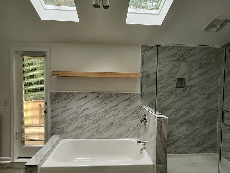 Master bath with soaking tub and shower