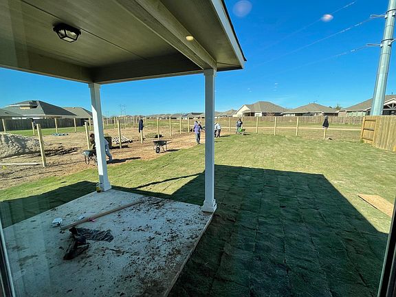 LARGE BACKYARD with COVERED PATIO on a LARGE PREMIUM LOT backing a trail