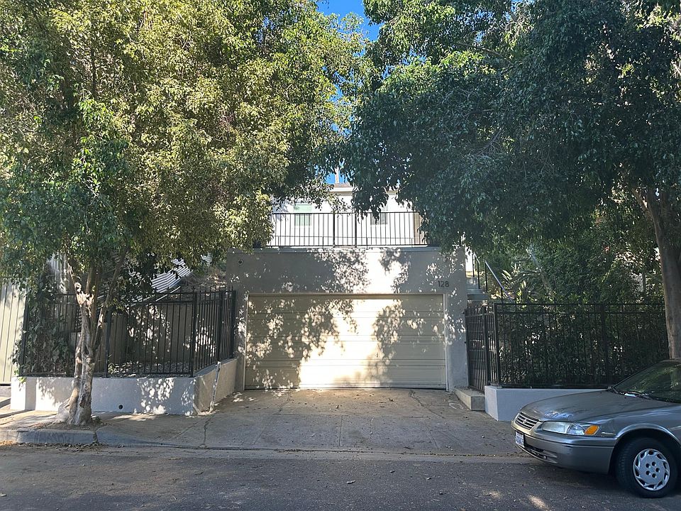 Hidden away by two lush trees on Douglas. Unassuming.