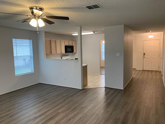 Open plan with kitchen overlooking living room