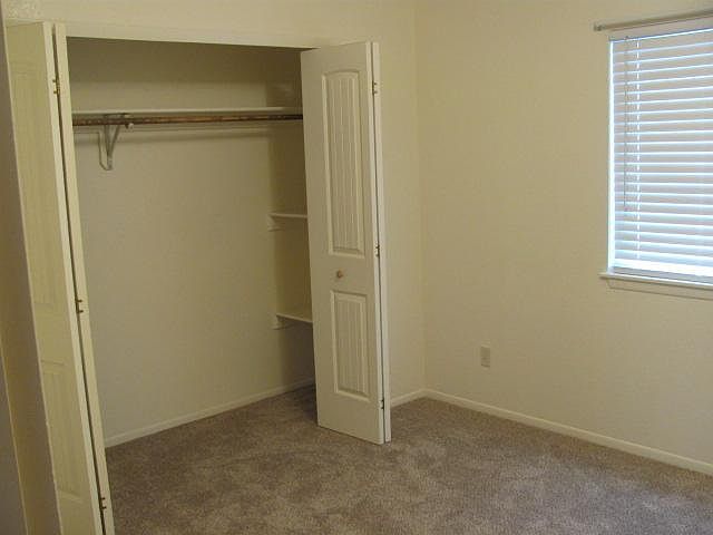 Second bedroom has new carpets and window coverings.