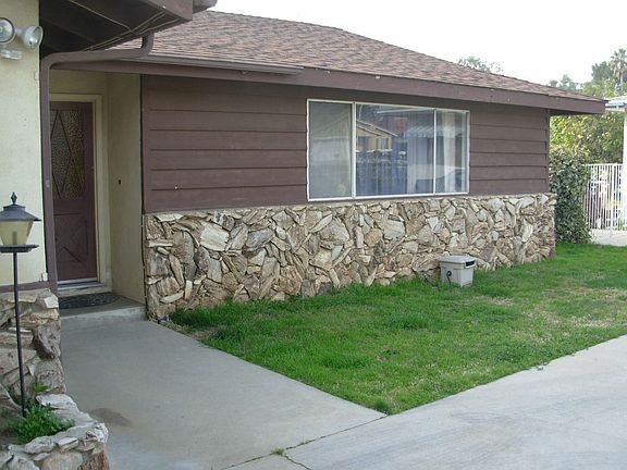 Facing northwest from the garage. The main entry is barely visible on the left