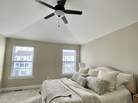 Master bedroom with vaulted ceiling
