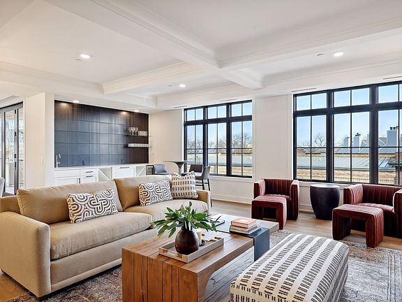 Oversized windows fill this unit with natural light