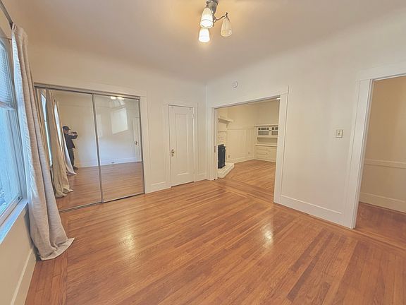 Bedroom to living room with pocket door open