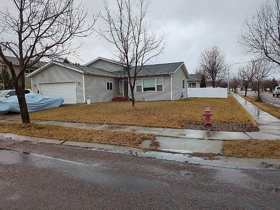 Outside of home showing corner lot.