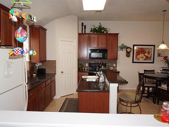 5th image of 15959 W Bellefontaine Way