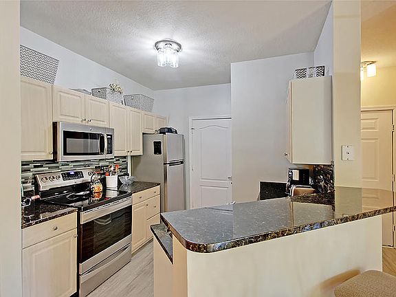 5th image of 1300 Park West Blvd Unit 405