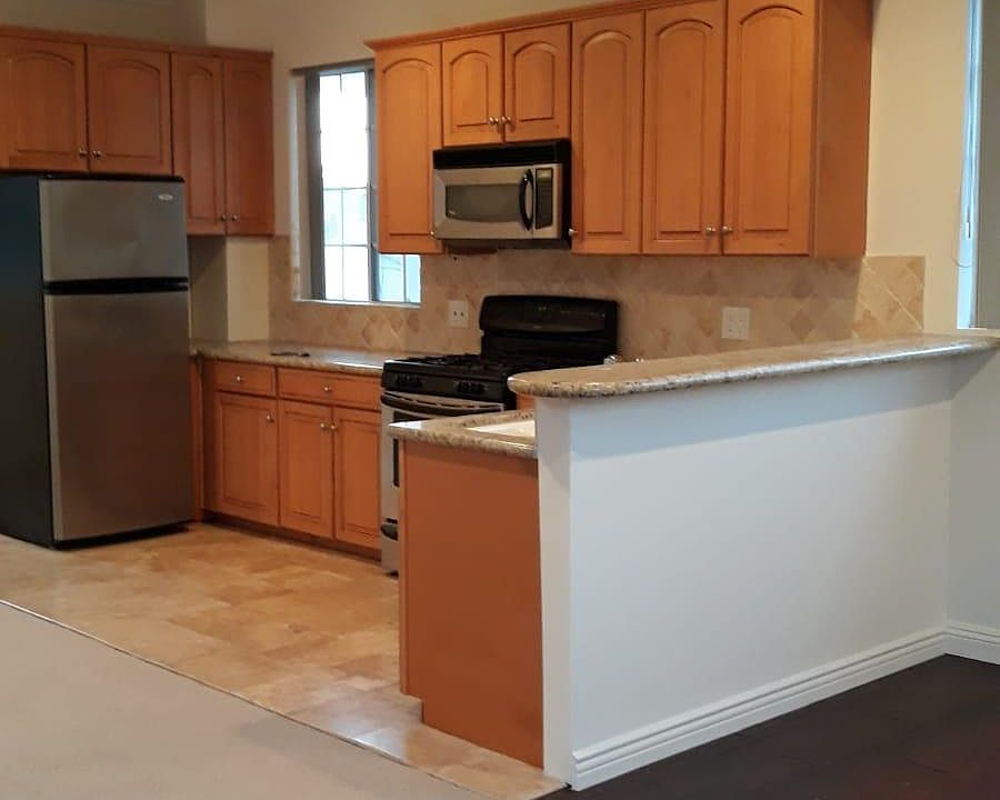 Kitchen with high bar