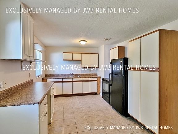 3rd image of 8059 Lourdes Dr N
