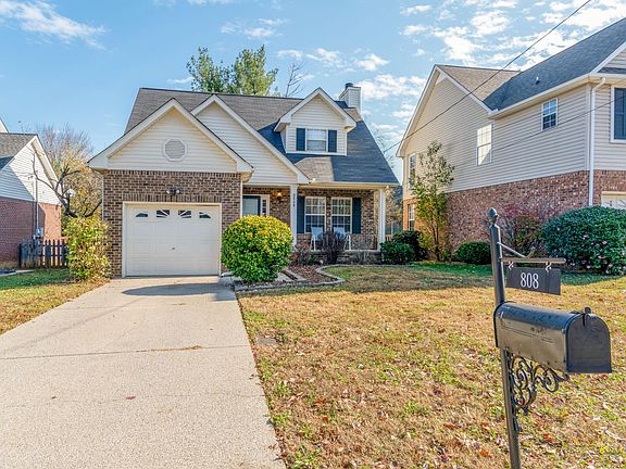 Concrete drive, one car garage.