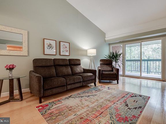 Charming condo with balcony overlooking woods.