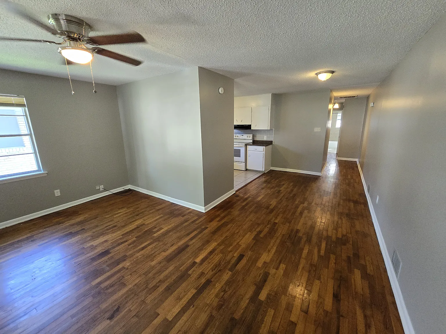 Cozy 2-Bedroom Duplex with Hardwood Floors & Functional Layout — Photo 3