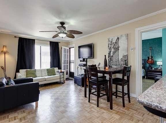Beautiful open floor plan covered in natural light; opens to balcony & attached to 2 en-suite bedroo