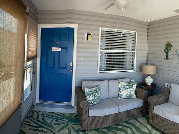 Climate controlled front porch. New windows with screens and shades!