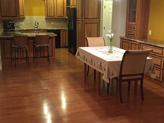 Dining/kitchen area with a li'l furniture...