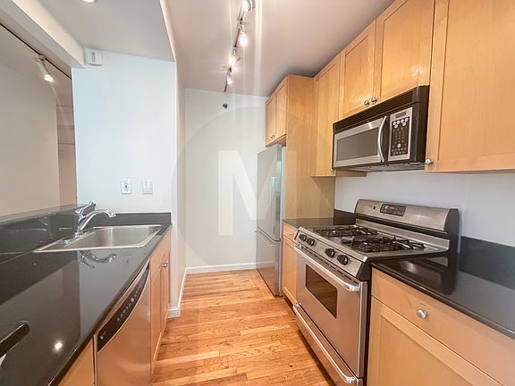 3rd image of 416 E 11th St APT 3B