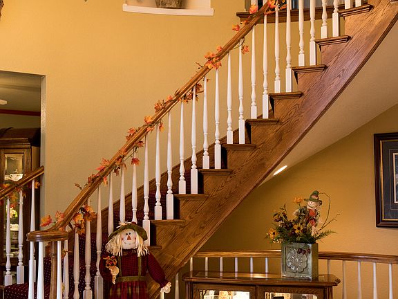 Foyer w/ Custom Curved Stair