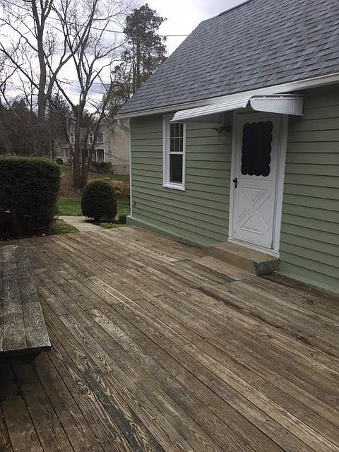Front Deck with bench seat - will be restained once weather permits (April)
