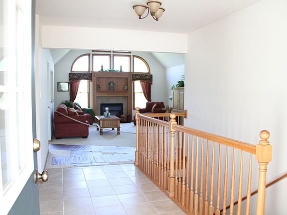 Foyer and Stairs to Basement