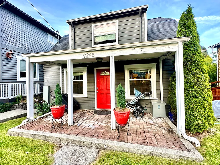 Front of house. Owner entrance. Shared electronic security package delivery box.