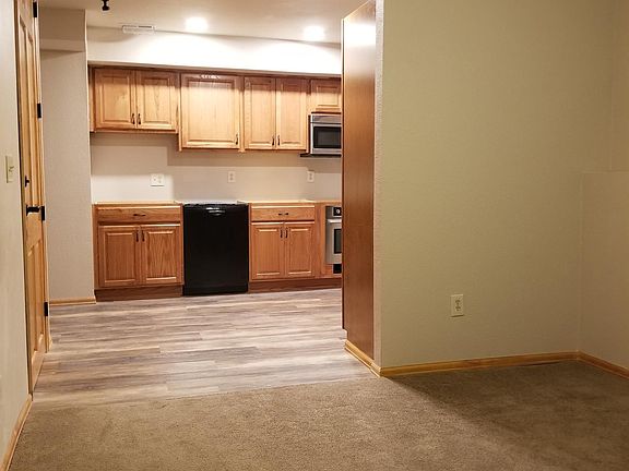 Kichen and living room with entrance on left