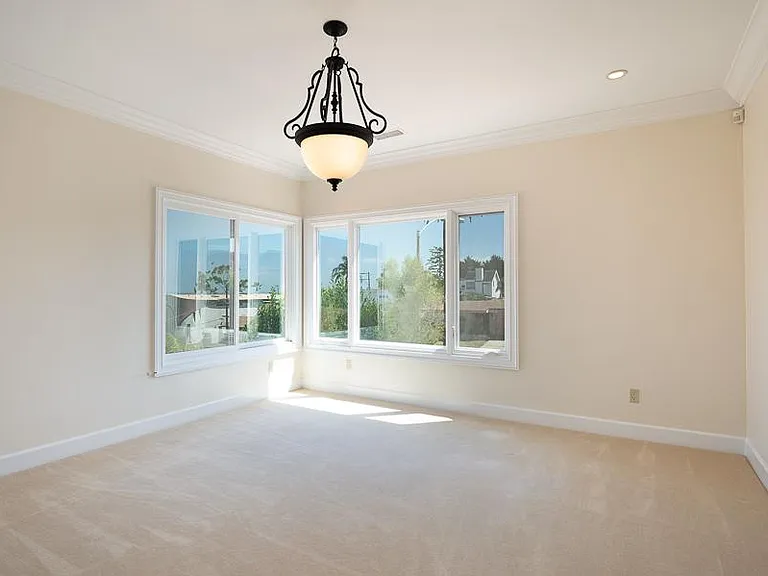 Large private Living Room with sweeping City, Harbor and Ocean views.