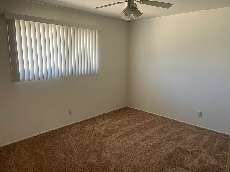 Bedroom 2 with walk in closet that connects to bedroom 1