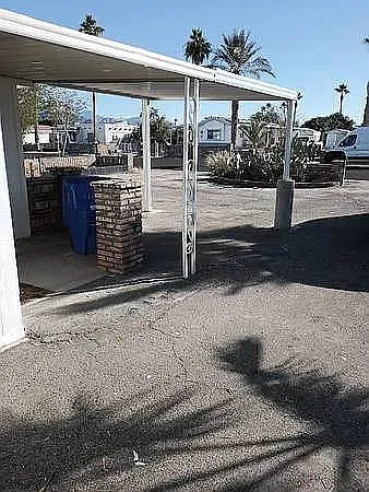 VIEW OF FRONT FROM PARKING AREA