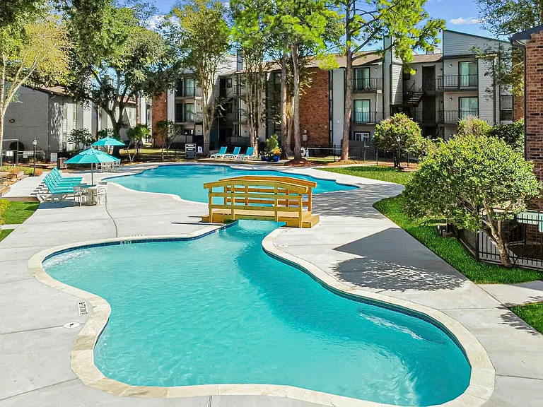 Driscoll Place | Houston, TX | Double Swimming Pool with Bridge