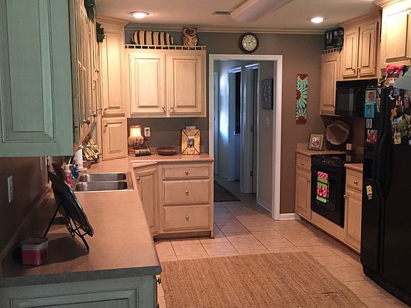 Kitchen with glazed cabinets