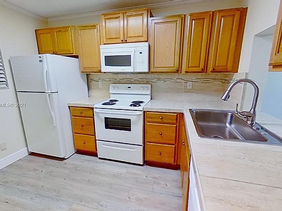2nd image of 7406 N Woodmont Ter #205