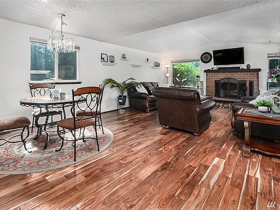 Dining area adjacent to Living Room with hardwood floor for easy maintenance.