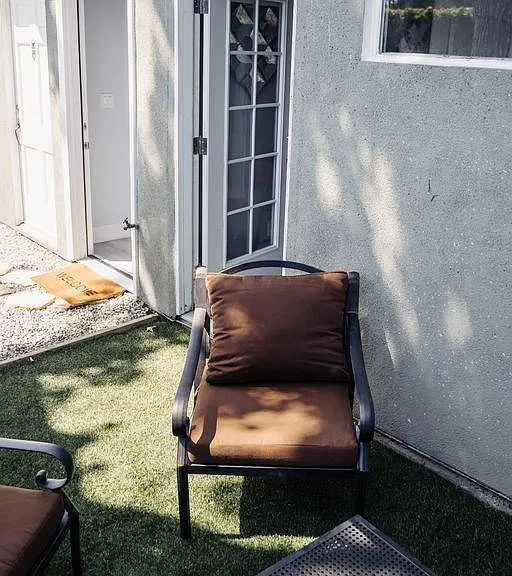 PRIVATE FENCED PATIO WITH BBQ GRILL & OUTDOOR SEATING/FURNITURE